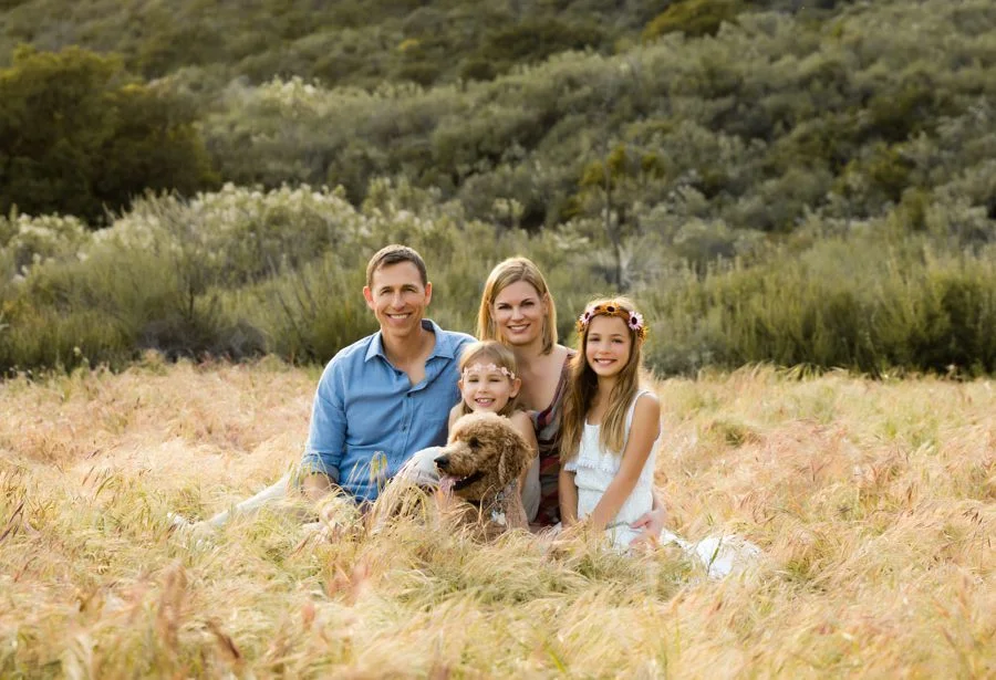 family outdoors dog