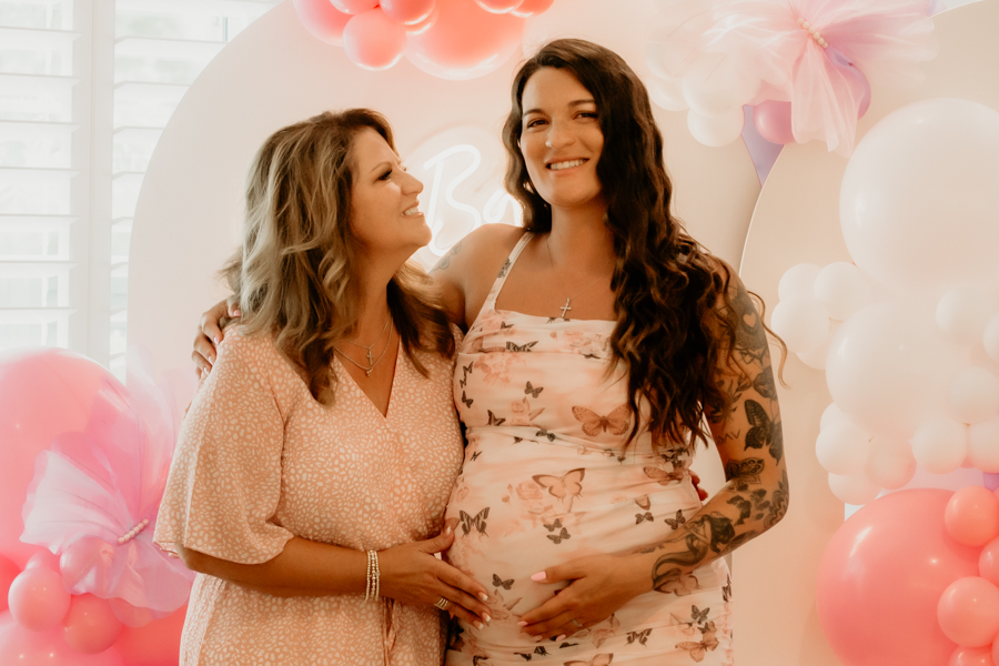 2V7A3867 Proud grandma to be smiling at her daughter mother to be.